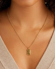 18k gold dog tag necklace from the jewelry brand Gorjana.