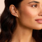 18k gold plated single huggie earring from the jewelry brand Gorjana.