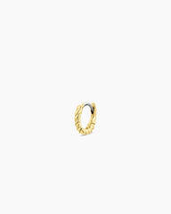 Single 18k gold huggie earring from the jewelry brand Gorjana.