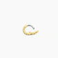 Single 18k gold huggie earring from the jewelry brand Gorjana.