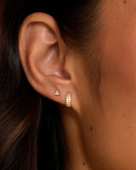 Single 18k gold plated wilder shimmer huggie earring from the jewelry brand Gorjana.