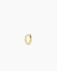 18k Gold Single Shimmer Charm Huggie Earring from the brand Gorjana.