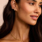 18k Gold Single Shimmer Charm Huggie Earring from the brand Gorjana.