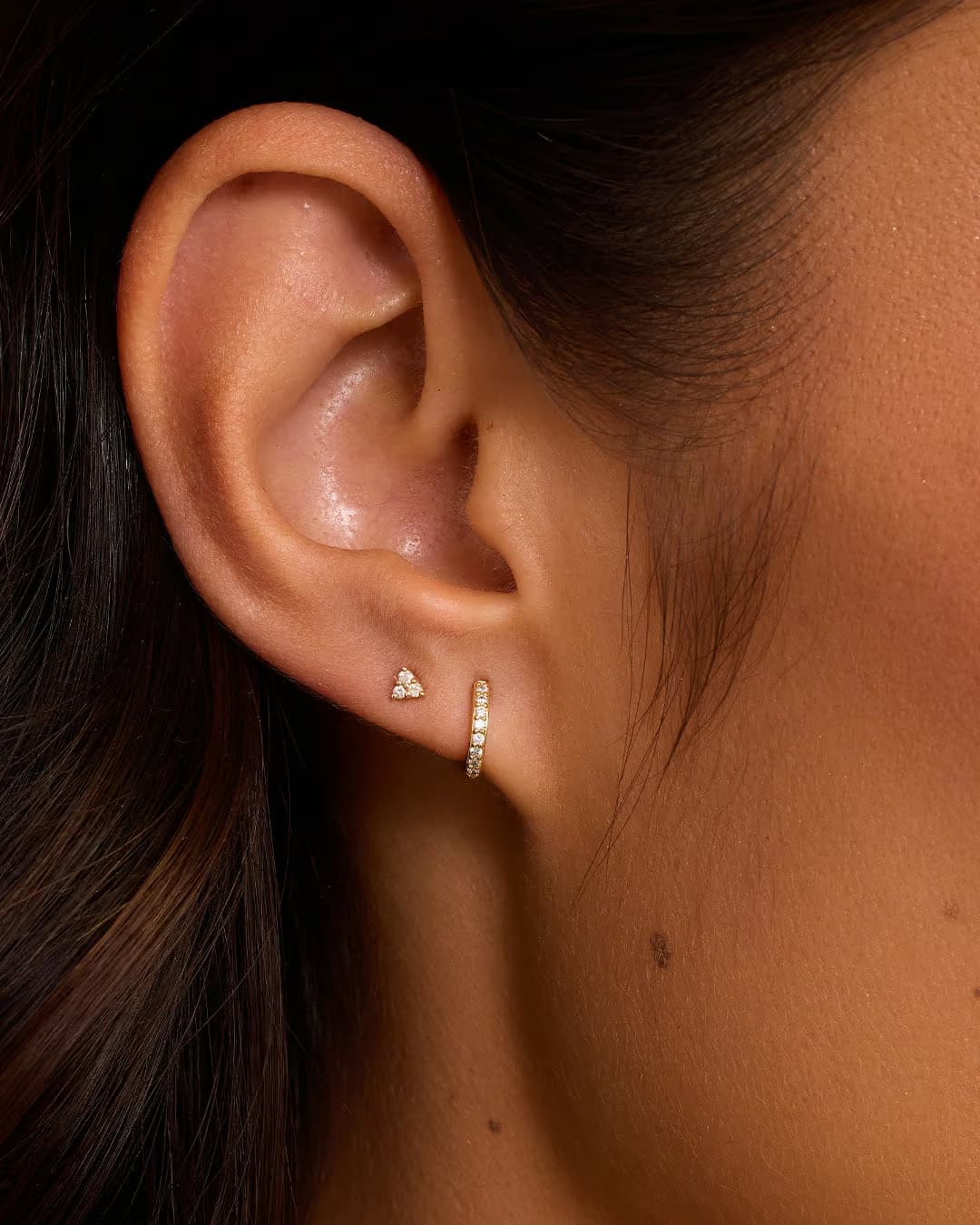 18k Gold Single Shimmer Charm Huggie Earring from the brand Gorjana.