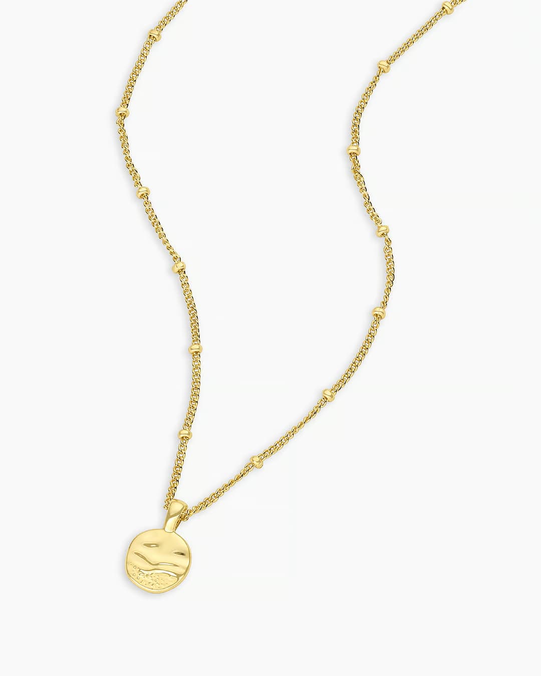 18k gold charm necklace from the jewelry brand Gorjana.