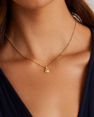 18k gold charm necklace from the jewelry brand Gorjana.