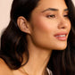 18k gold single huggie earring from the jewelry brand Gorjana.