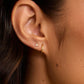 18k gold single huggie earring from the jewelry brand Gorjana.