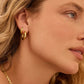 18k gold lou hoop earrings from he brand Gorjana.