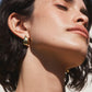 18k gold plated tear drop stud earrings from the jewelry brand Gorjana.