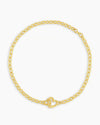 Gold chain bracelet with a mini heart closure from the brand of Gorjana. The gold is 18k gold plated.