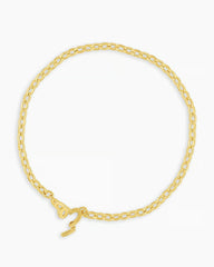 Gold chain bracelet with a mini heart closure from the brand of Gorjana. The gold is 18k gold plated.