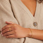 Gold chain bracelet with a mini heart closure from the brand of Gorjana. The gold is 18k gold plated.