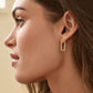 18k gold plated parker huggie earrings from the jewelry brand Gorjana.
