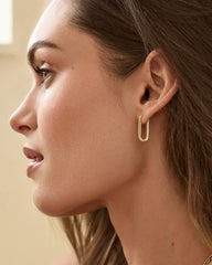 18k gold plated parker huggie earrings from the jewelry brand Gorjana.