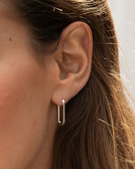 Silver plated parker huggie earrings from the jewelry brand Gorjana.