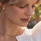 18k gold huggie earrings from the jewelry brand Gorjana.