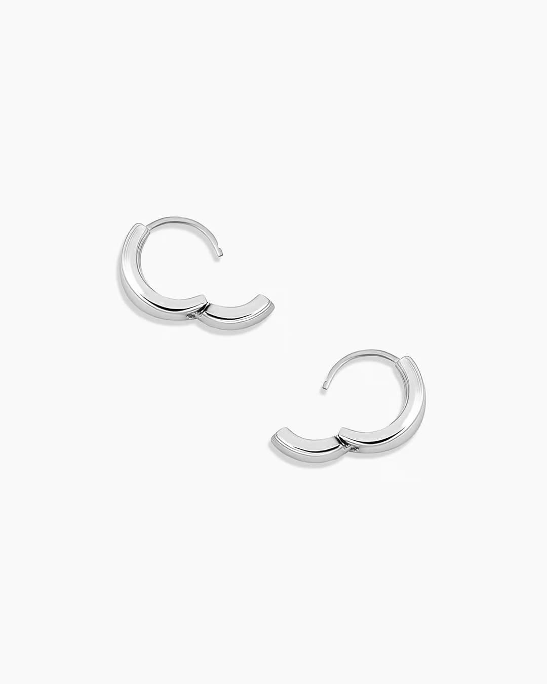 Silver plated huggie earrings from the jewelry brand Gorjana.