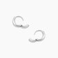 Silver plated huggie earrings from the jewelry brand Gorjana.