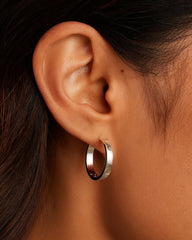 Silver plated Rose Hoop Earrings from the jewelry brand Gorjana.