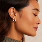 Silver plated Rose Hoop Earrings from the jewelry brand Gorjana.
