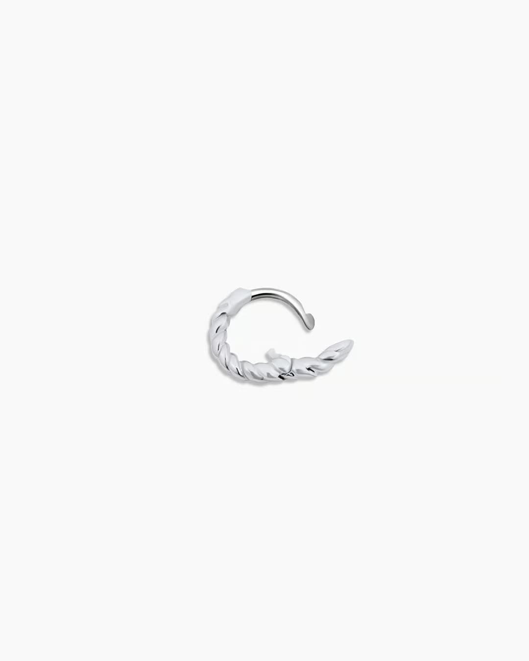 Single silver huggie earring from the jewelry brand Gorjana.