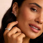 Single silver huggie earring from the jewelry brand Gorjana.