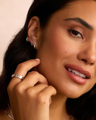 Single silver huggie earring from the jewelry brand Gorjana.