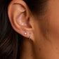 Single silver huggie earring from the jewelry brand Gorjana.