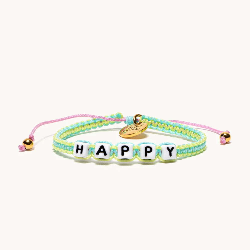 A woven bracelet in the color green, that reads 'happy'.