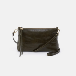 Darcy Crossbody bag designed out of polished leather in the color deep moss (green). This crossbody is from the handbag brand HOBO.