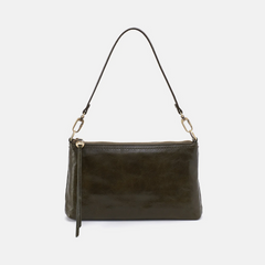Darcy Crossbody bag designed out of polished leather in the color deep moss (green). This crossbody is from the handbag brand HOBO.