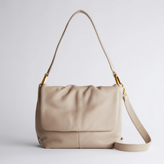 Harley Convertible Shoulder Bag in the color Taupe. The bag is designed from Pebbled leather from the brand HOBO.