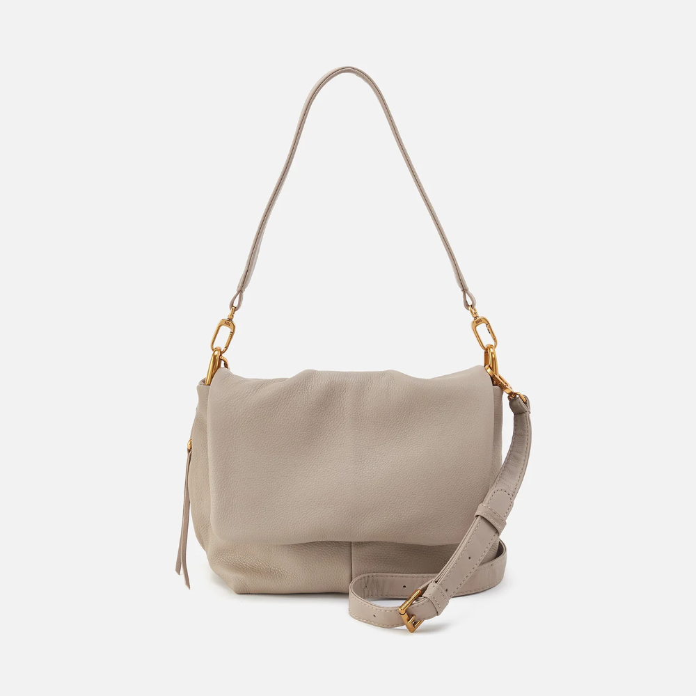 Harley Convertible Shoulder Bag in the color Taupe. The bag is designed from Pebbled leather from the brand HOBO.