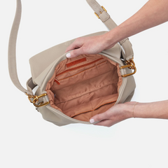 Harley Convertible Shoulder Bag in the color Taupe. The bag is designed from Pebbled leather from the brand HOBO.