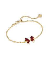 Gold chain necklace with a Bright Red bow from Kendra Scott.