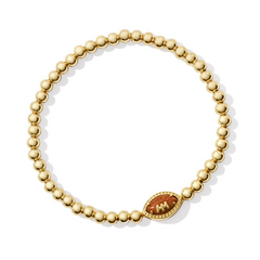 Gold colored stretch bracelet from Kendra Scott with a football pendant.