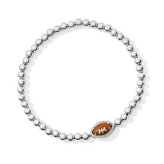 Silver colored stretch bracelet from Kendra Scott with a football pendant.