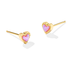 Gold heart shape stud earrings with a Pink charm in the middle, from the jewelry brand Kendra Scott.