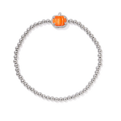 A Halloween themed pumpkin stretch bracelet from Kendra Scott. An orange charm, with a silver bead bracelet.