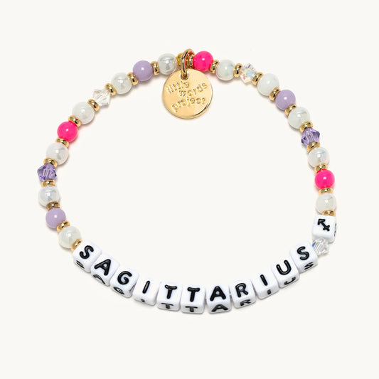 A beaded bracelet with the word Sagittarius, from Little Words Project®. 1200