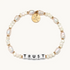 Hand-crafted, freshwater pearl beaded bracelet from Little Words Project. The bracelet reads, TRUST.