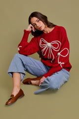 Long Sleeve Crew Neck Ribbon Sweater Top in the color red.