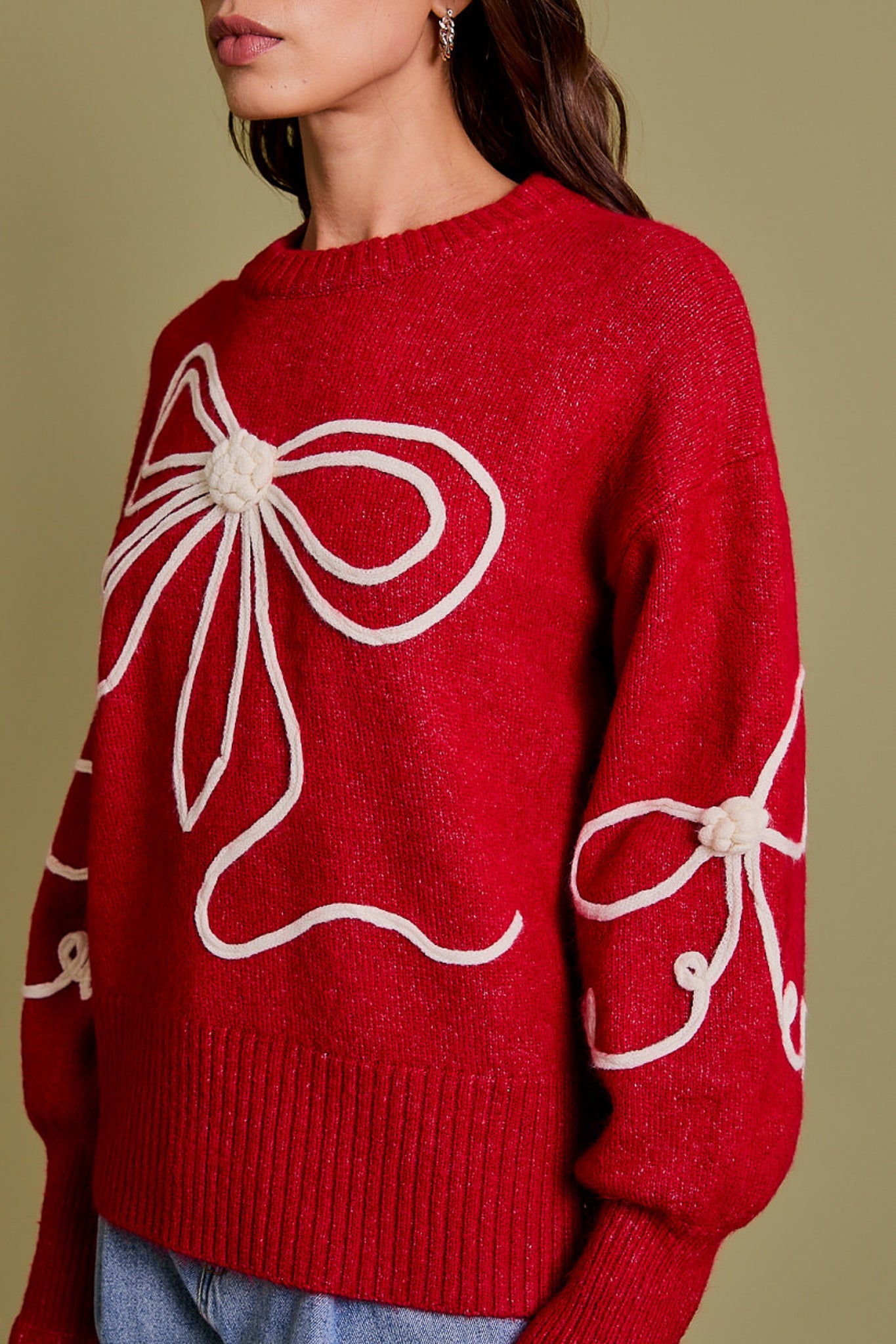 Long Sleeve Crew Neck Ribbon Sweater Top in the color red.