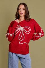 Long Sleeve Crew Neck Ribbon Sweater Top in the color red.