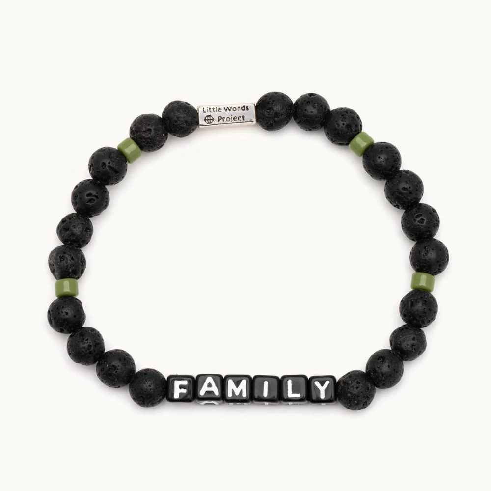 Black bead bracelet from Little Words Project that reads, "Family."