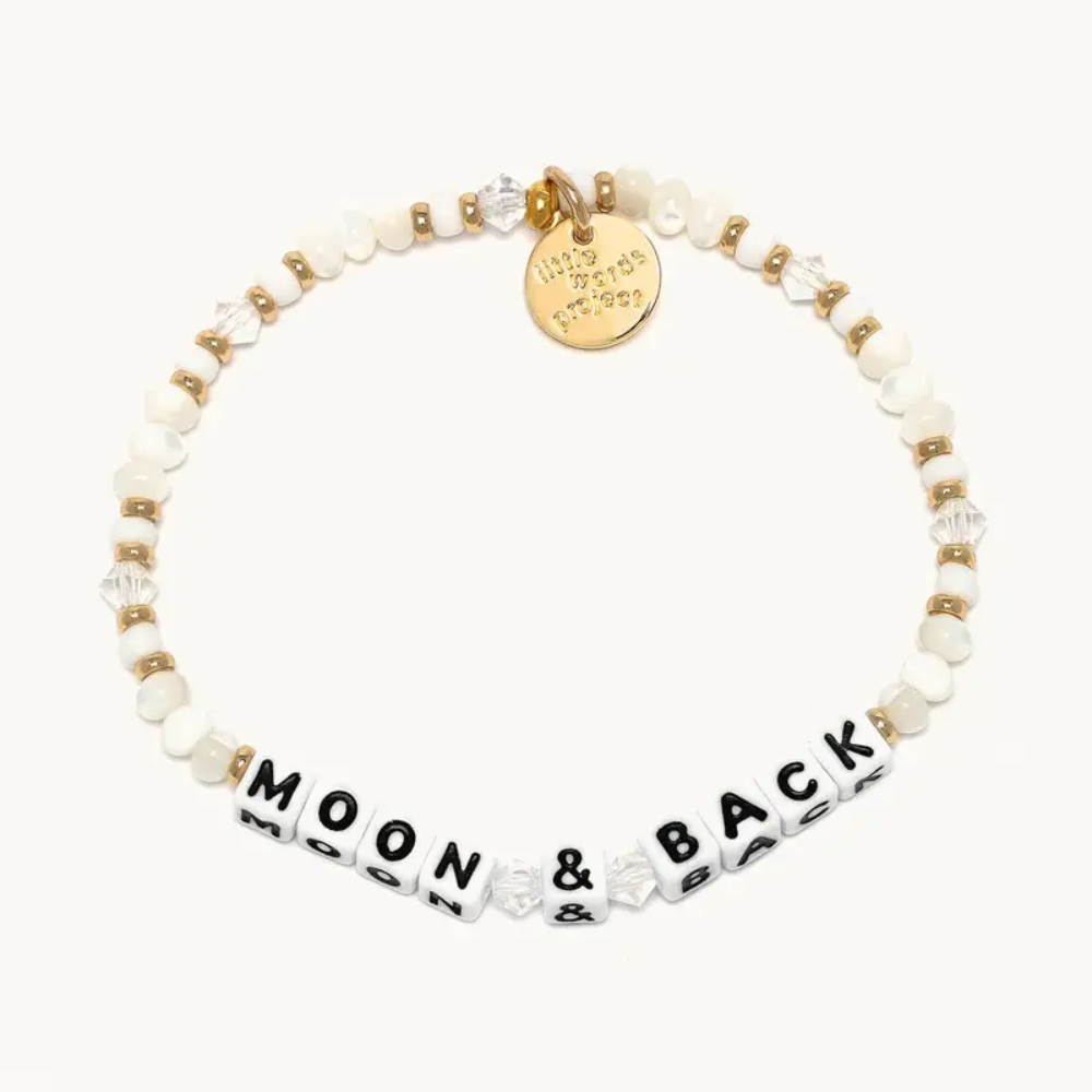 A tan and brown color bead bracelet from Little Words Project. The bracelet reads, Moon and Back.