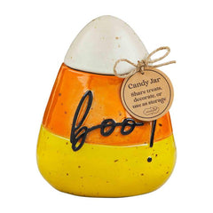 A Candy Corn Candy Jar from Mud Pie, that reads boo!