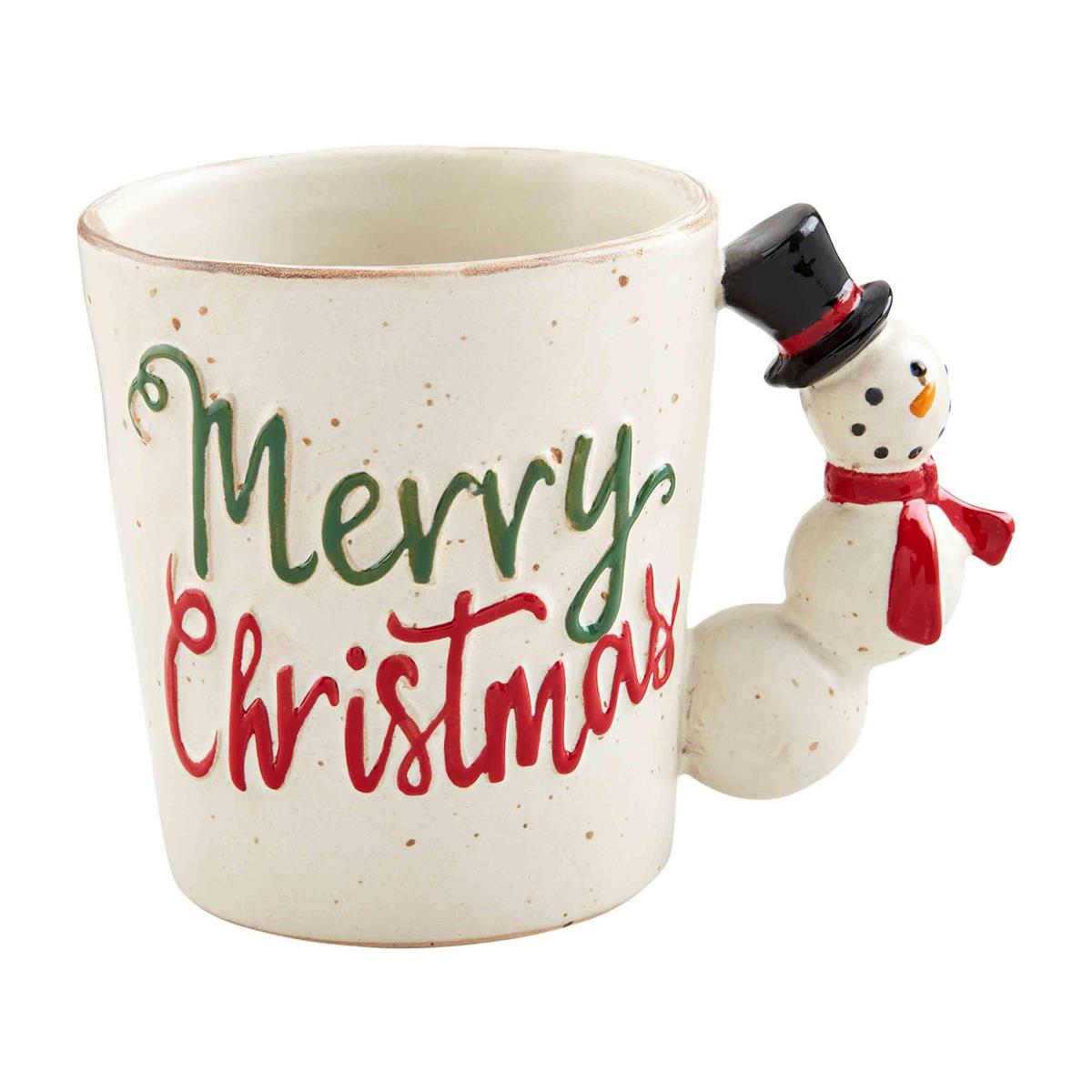 A Merry Christmas coffee mug, with a snowman wearing a top hat, and red scarf as the handle. Designed by Mud Pie.