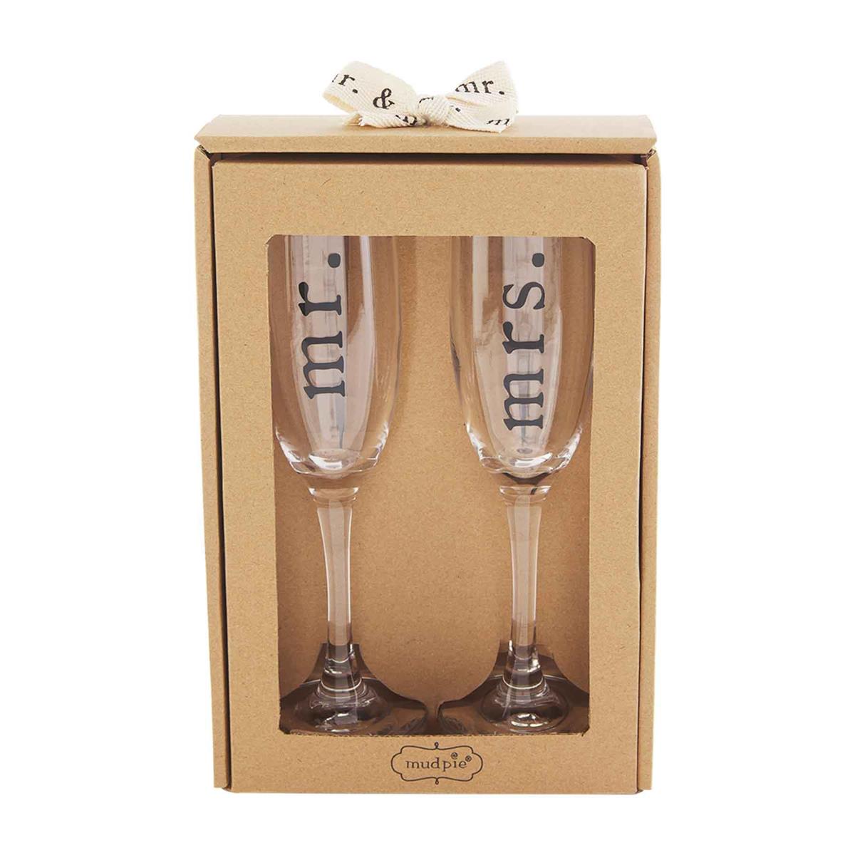 A set of Champagne Flue glasses that read Mr. and Mrs.